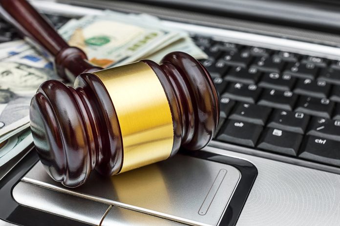 Wyoming Man Pleads Guilty to 7 Counts of Wire Fraud
